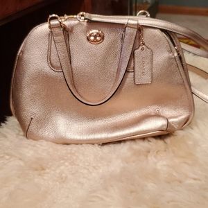 Coach metallic gold crossbody purse.